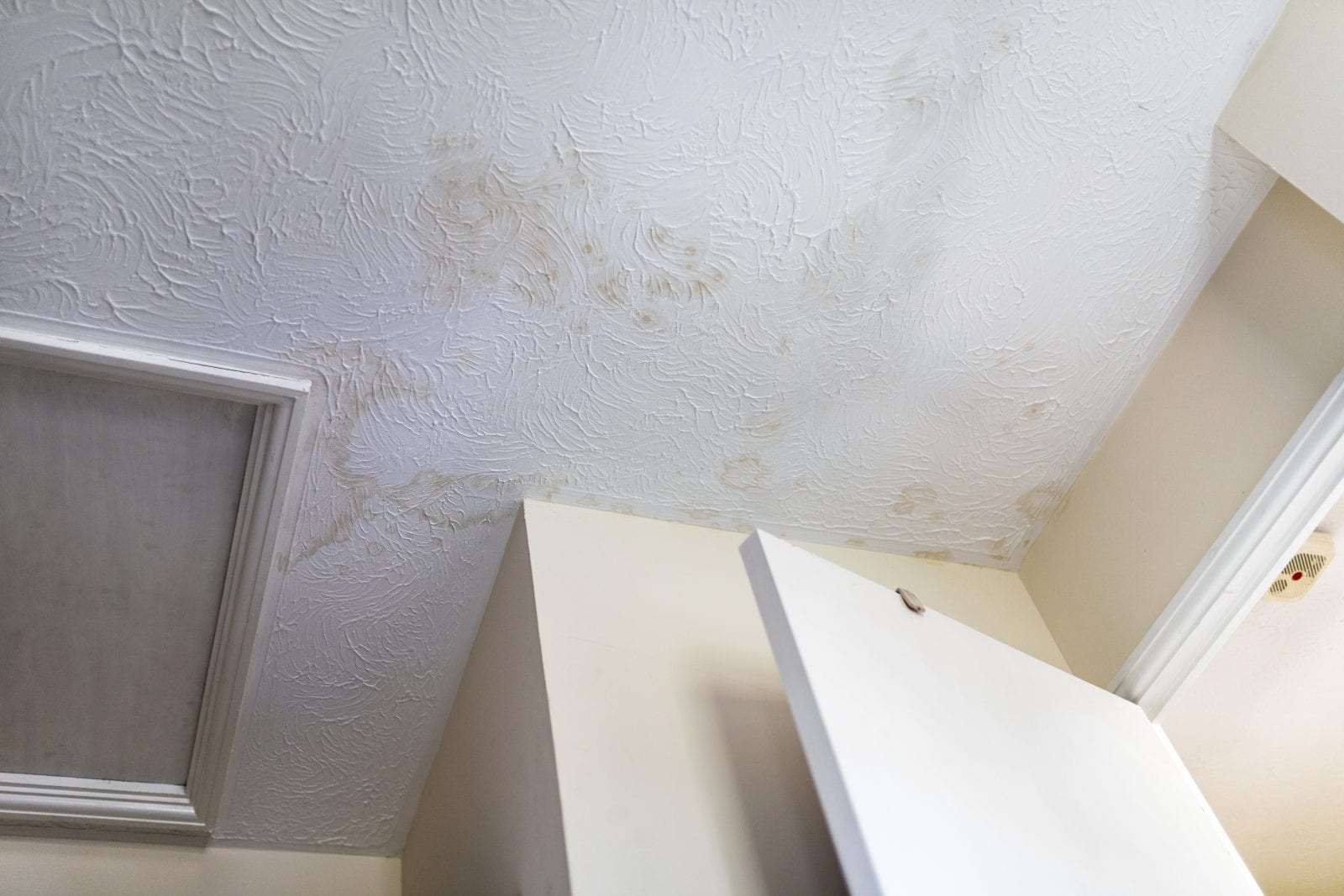 Stains on the ceiling after water leakage Stains on the ceiling after water leakage